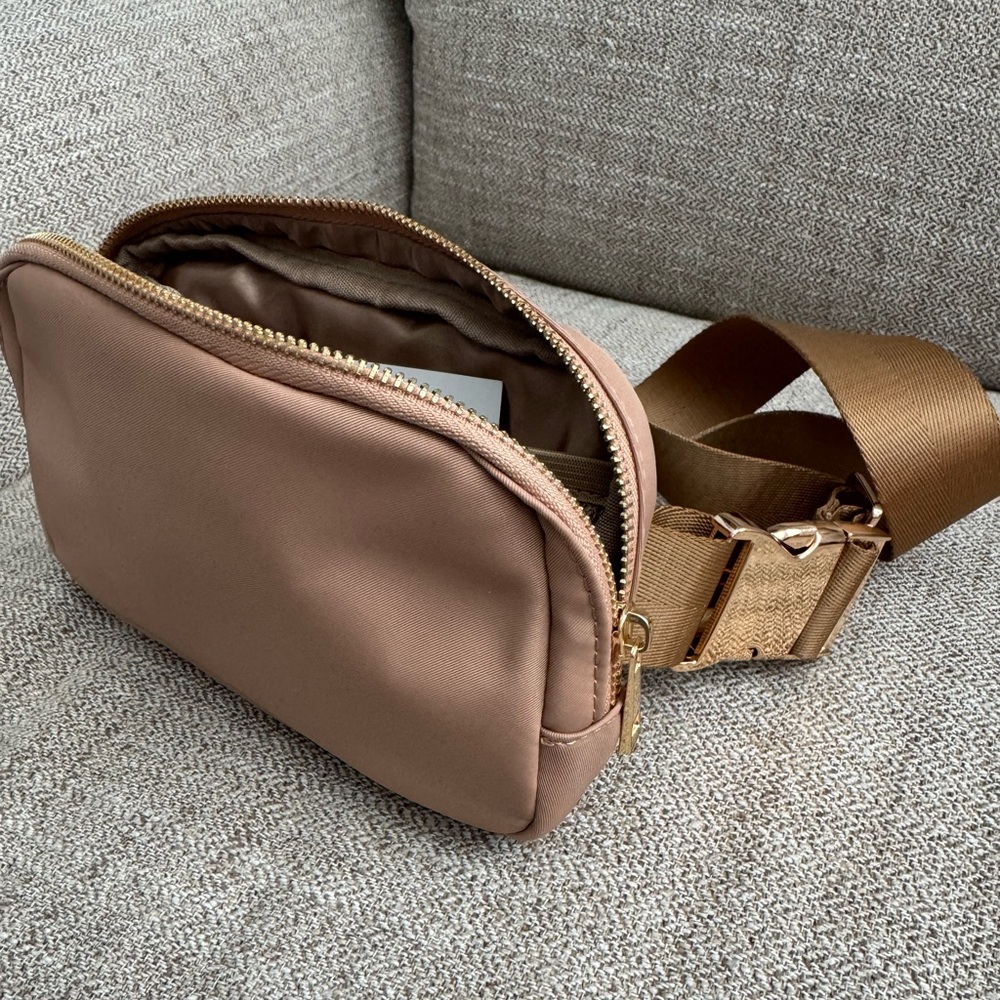 Waist bag with gold accents